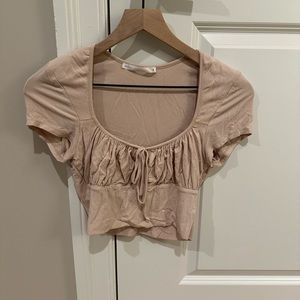 tan ruffled top